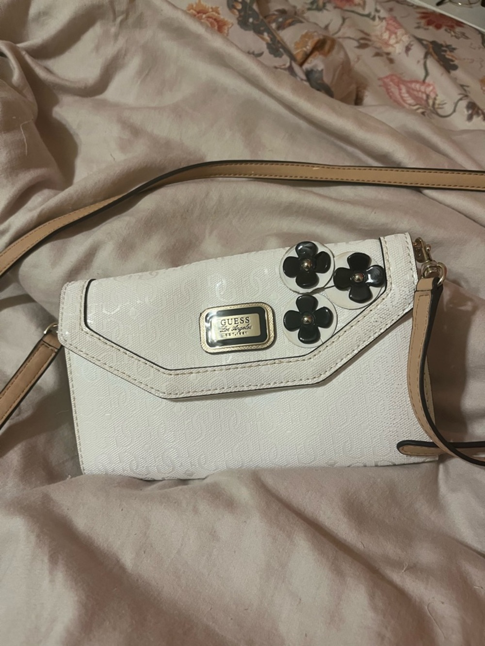 GUESS White Crossbody with Black Floral Appliqués and Tan Strap